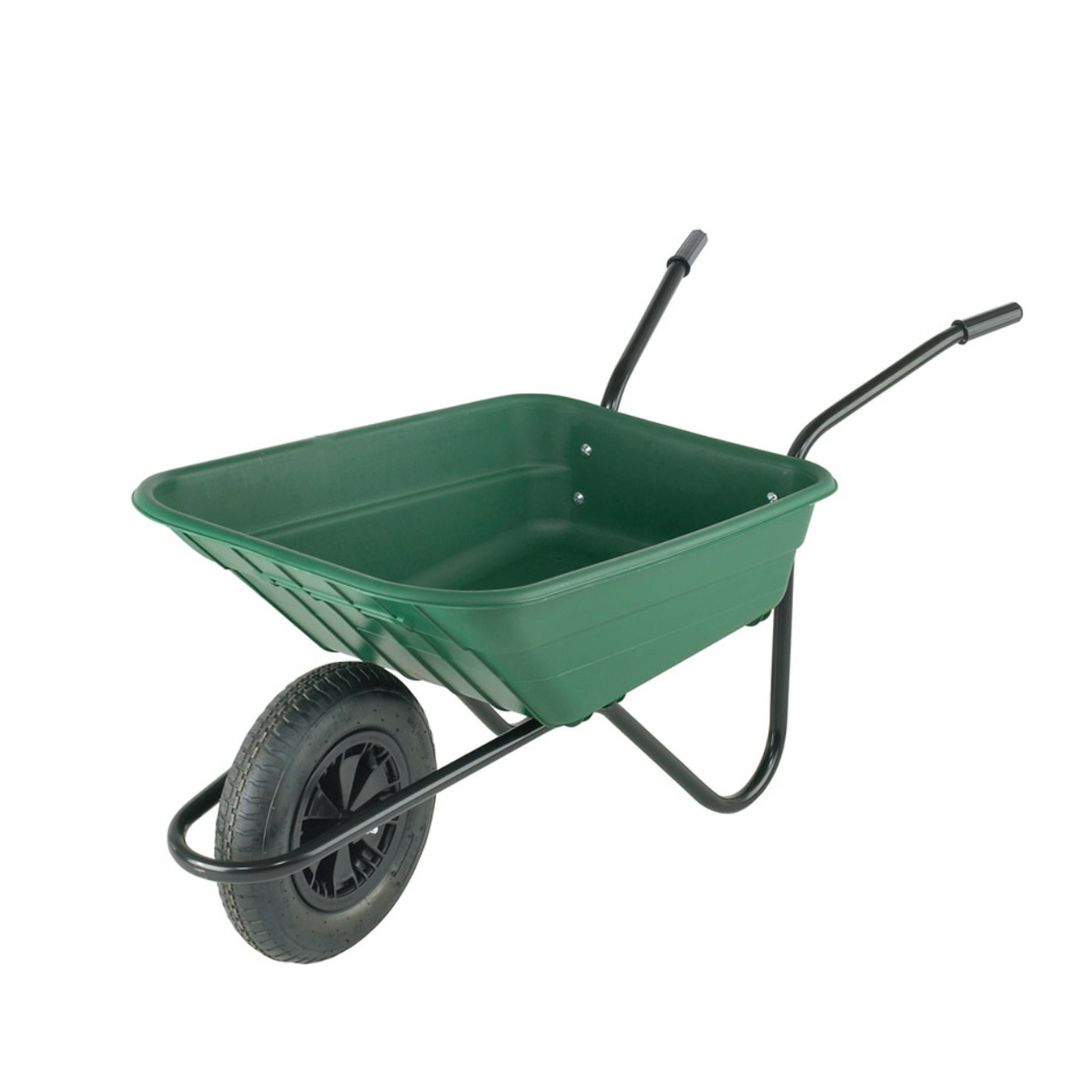 A green wheelbarrow, a common sight at a building material store, ready to transport construction supplies efficiently.